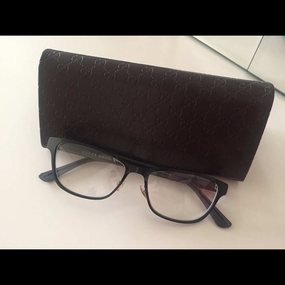 Authentic GUCCI eye glasses with gold arms